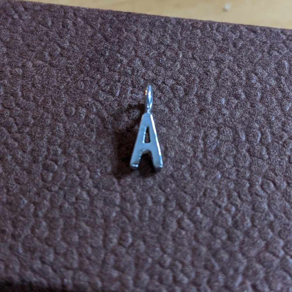 Michelle Change letter A silver initial pendant